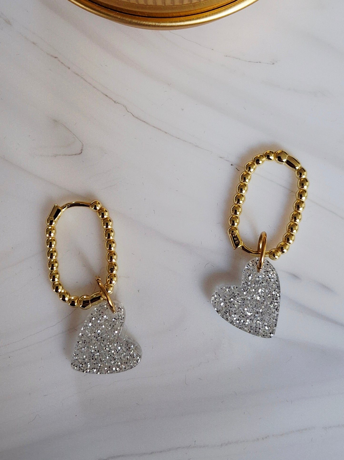 Boucles d’oreilles Pio variante argenté