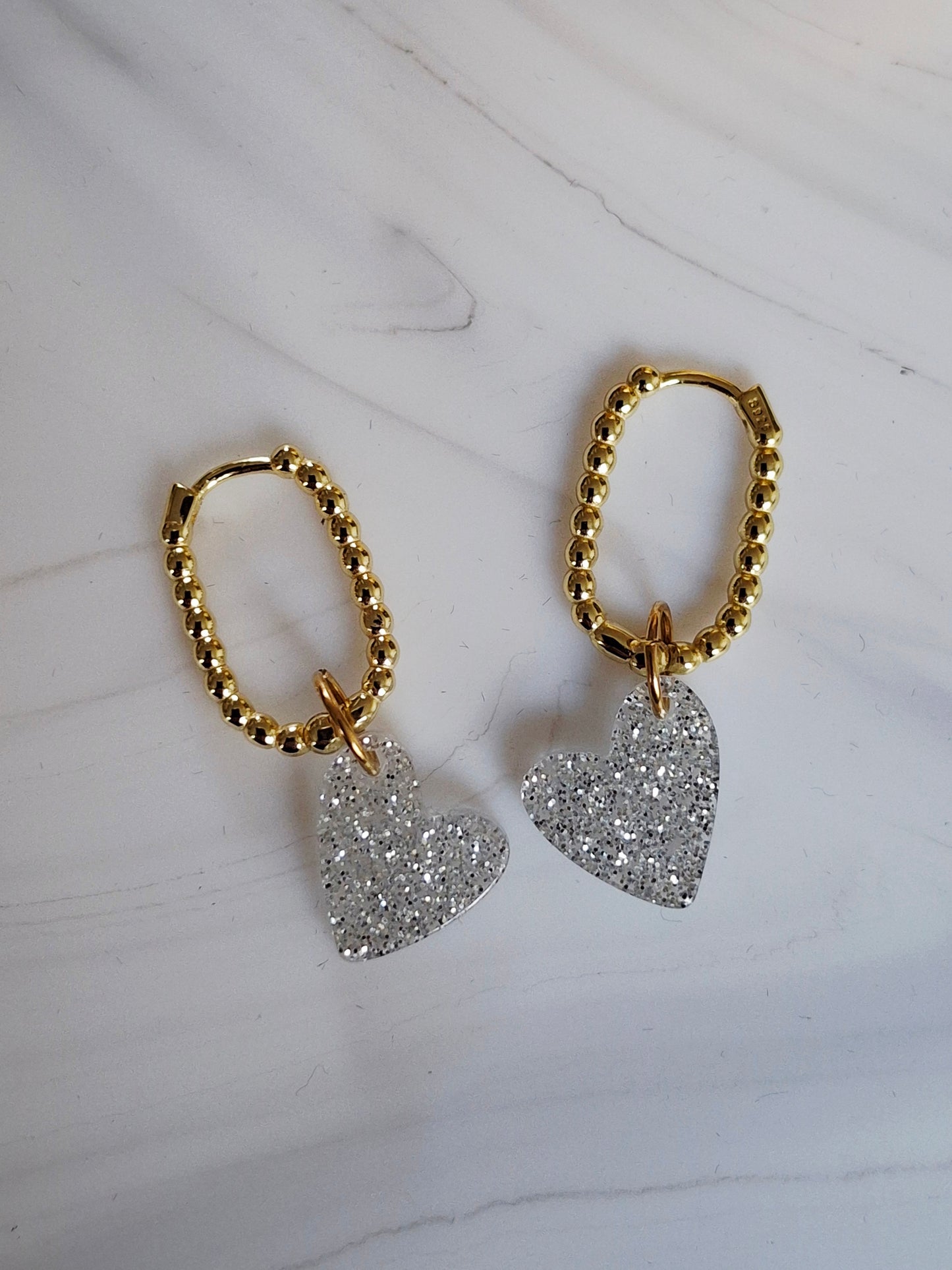 Boucles d’oreilles Pio variante argenté